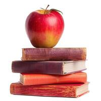 Apple on stack of hardcover books photo