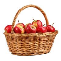 Wicker basket full of fresh red apples photo
