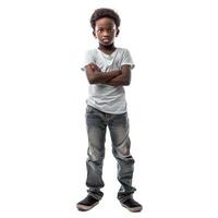Serious young boy standing with folded arms on white background photo