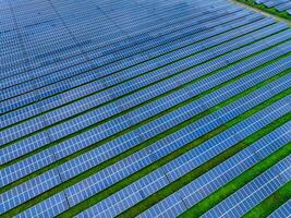 Aerial view of solar farm. Sustainable renewable energy and modern photovoltaic technology for eco-friendly electricity production. Solar power station. Green energy solutions. Solar panel technology. photo