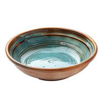Empty blue and orange round ceramic bowl with spiral pattern isolated on white background photo