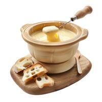 Pot of melted cheese fondue with dipping fork and bread on wooden board photo