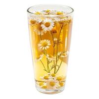 Chamomile tea in transparent glass photo