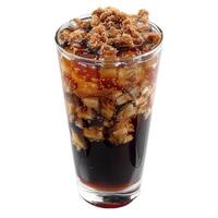 Glass of cola with ice cubes and brown sugar topping on white background photo