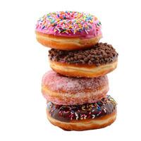 Stack of four donuts with various toppings is making your mouth water photo