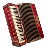 Vintage red piano accordion lying on white background photo