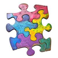 Colorful puzzle pieces forming a complete jigsaw puzzle photo
