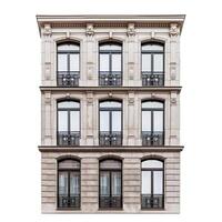 Beautiful classical parisian building facade with many windows and balconies isolated on white photo