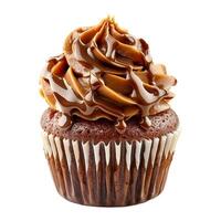Chocolate cupcake with caramel frosting dripping isolated on white background photo