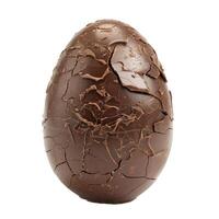 Big real chocolate easter egg cracked and broken on white background photo