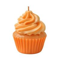 Orange cupcake candle burning with single wick on white background photo