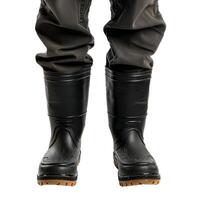 Worker wearing protective waterproof boots standing on white background photo