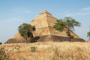 Ancient nubian pyramid standing in the desert of sudan photo