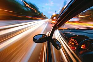 Car driving fast on highway at night with motion blur photo