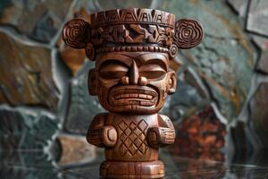 Traditional polynesian wooden statue standing on a table photo