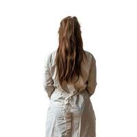 Woman wearing apron with her back turned standing isolated on white background photo