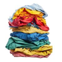 Stack of colorful clothes waiting to be folded photo
