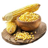 Two corn cobs and kernels in wooden bowl on rustic table photo