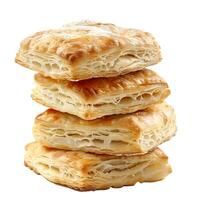 Stack of four square puff pastries forming a tower on white background photo