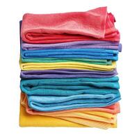 Stack of colorful folded towels forming a rainbow pattern photo