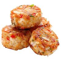 Delicious crab cakes with parsley and red pepper on top photo