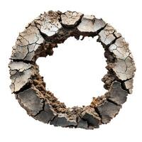 Cracked and dried soil forming a circle shape on white background photo