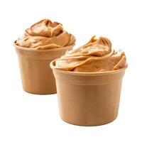 Two paper cups overflowing with creamy peanut butter photo