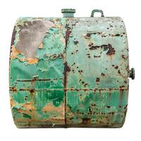 Old rusty metal tank showing peeling green paint isolated on white photo