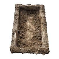 Empty rectangular grave dug in the ground waiting burial photo