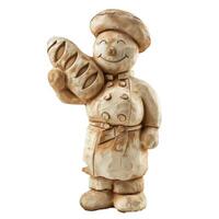 Smiling baker figurine holding loaf of fresh bread photo