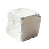 Single white marshmallow with cracked surface on white background photo