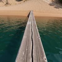 Abstract river scene water and natural elements depicted on an old wooden slab with a darkturquoise epoxy finish viewed from above over a sandy beach and riverbanks drone perspective photo