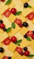 Cheese tomato olive assortment arranged in a harmonious design dairybased with sliced vegetables photo