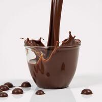 Chocolate spilling from a glass bowl empty space for text overlay or caption photo