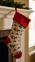 A digital illustration featuring a whimsical holidaythemed sock adorned with Santa Claus reindeer snowflakes and festive patterns for a warm and cheerful winter motif photo