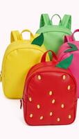 Set of three fruitthemed backpacks strawberry banana apple for kids each item displayed individually photo
