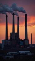 Industrial cityscape at sunset featuring large smokestacks belching pollutionfilled clouds into a twilight sky photo