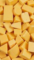 Highdefinition photorealistic image showcasing an intricate Parmesan cheese chunk pattern up close photo