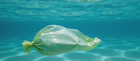 Plastic bag floats underwater on Earth Day to symbolize environmental concerns related to pollution photo