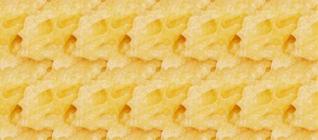 Intricate design showcasing repeated imagery of cheese slices forming an aesthetically pleasing pattern on a surface photo