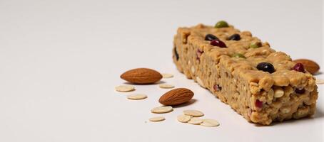 A healthful scene featuring a granola bar with almonds and oats showcasing nutritional snacks fitness diets and natural ingredients photo