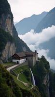 Ancient mountain village in morning fog surrounded by towering peaks embodies mysterious beauty and peaceful tranquility photo