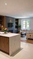 A luxurious Europeanstyle home showcases an inviting cozy living room setting with a kitchen sofa table and fireplace photo