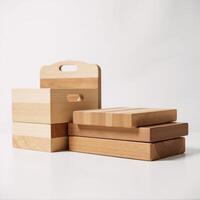 Neatly stacked wooden cutting boards displayed in the kitchen for culinary purposes photo