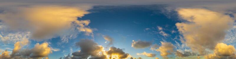 Dark blue sunset sky panorama with Cumulus clouds. Seamless hdr pano in spherical equirectangular format. Complete zenith for 3D visualization, game and sky replacement for aerial drone 360 panoramas. photo