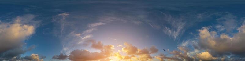 Dark blue sunset sky panorama with Cumulus clouds. Seamless hdr pano in spherical equirectangular format. Complete zenith for 3D visualization, game and sky replacement for aerial drone 360 panoramas. photo