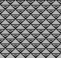 Seamless geometric pattern in the form of black and white triangles on a gray background vector