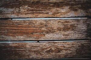 A close up of a wooden plank with a green background photo