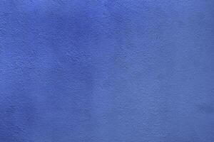 Textured Blue Wall Background with Subtle Variations in Hue for Design and Creative Projects photo