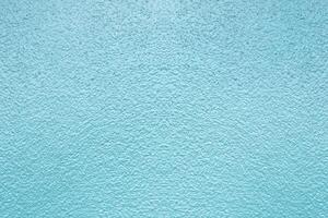 Textured Blue Surface with Subtle Patterns Creating a Calm and Serene Background for Design and Creative Projects photo
